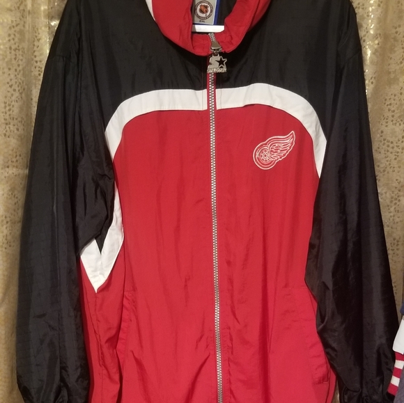Red Wings starter jacket.
